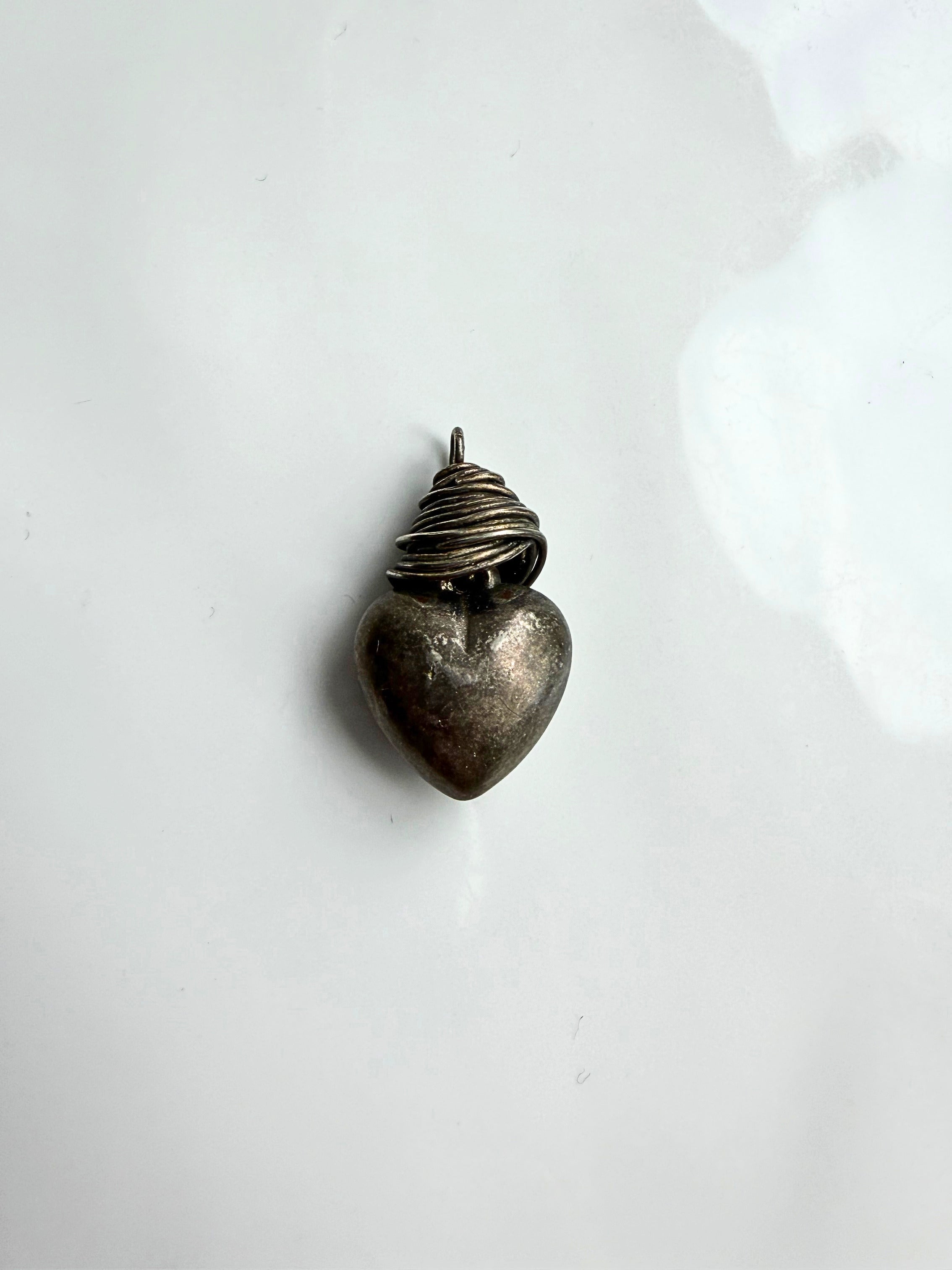 The Nestled Heart Charm